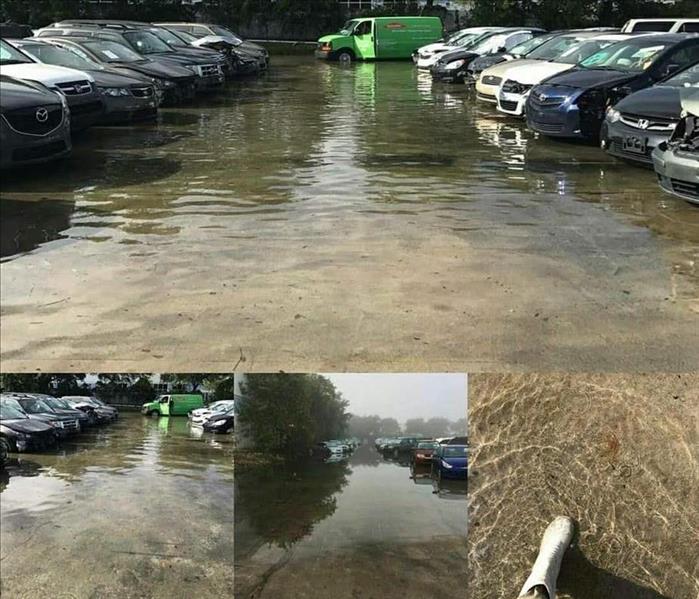 Parking lot with green SERVPRO service van in wheel-deep water